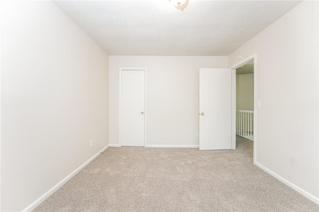 884 3rd Street Stone Mountain, GA 30083 - Photo 6 of 26 a view of an empty room