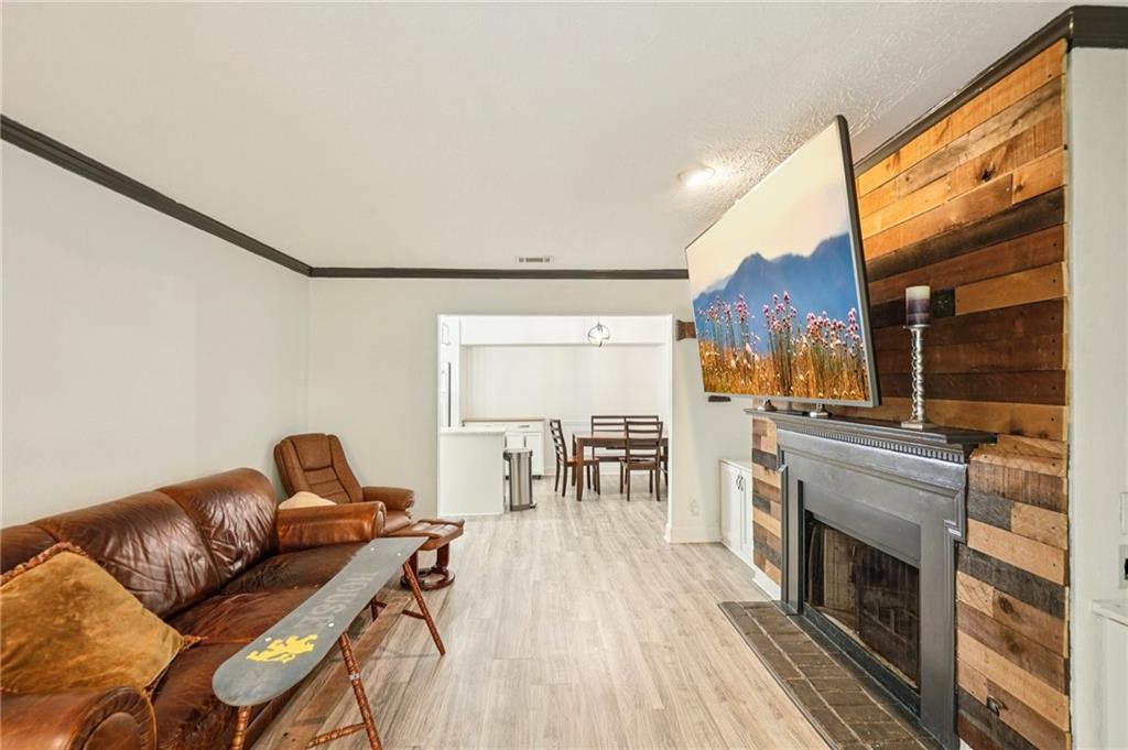 2071 Brian Way Decatur, GA 30033 - Photo 11 of 28 a living room with furniture and a fireplace