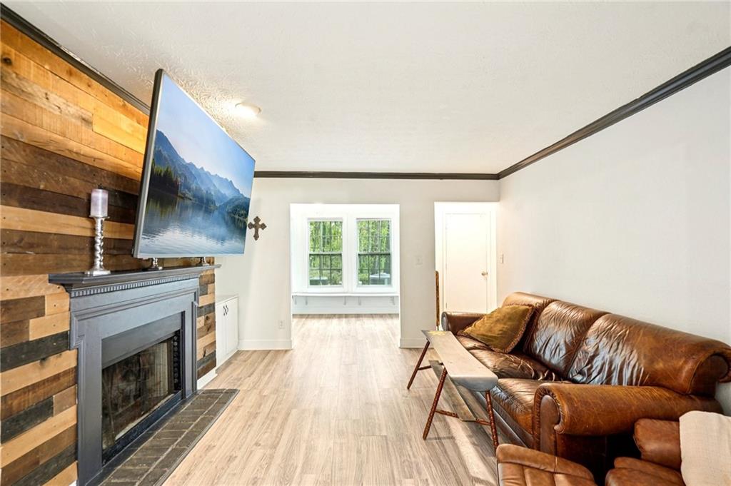 2071 Brian Way Decatur, GA 30033 - Photo 4 of 28 a living room with furniture and a fireplace