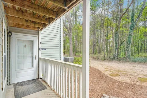 a view of a porch with a backyard