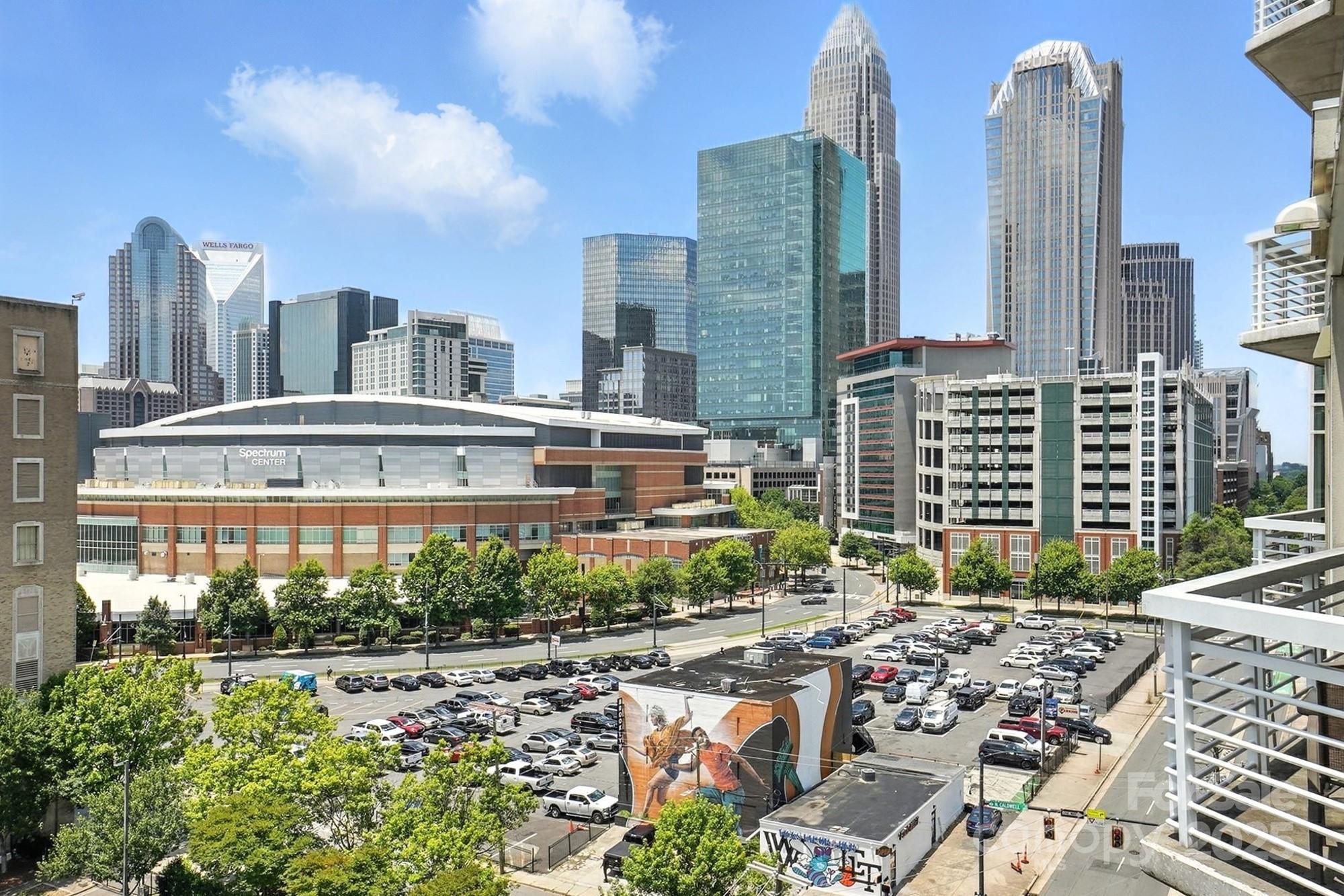 a view of a city with tall buildings