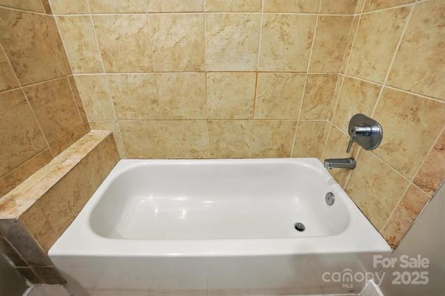 a view of a balcony next to a building