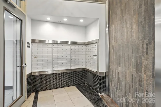 an aerial view of residential building with parking space