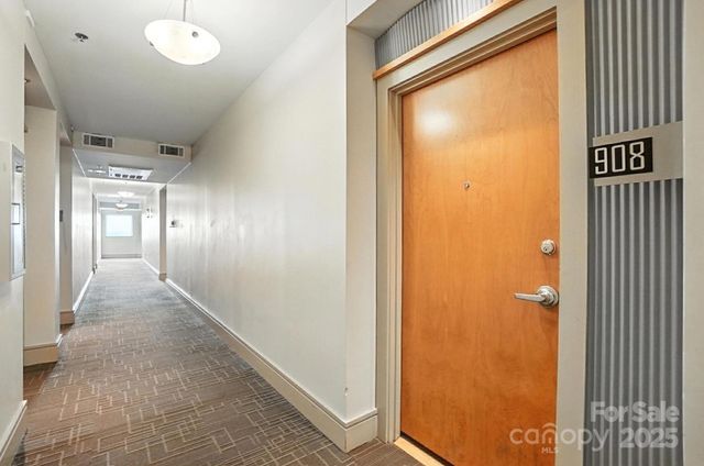 a view of gallery with windows