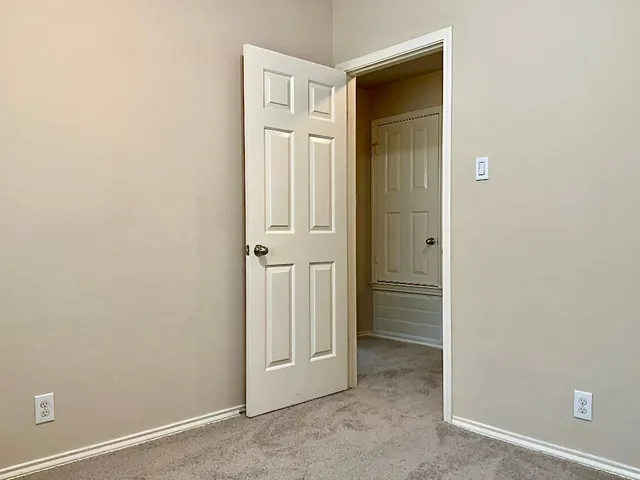 an empty room with an entryway