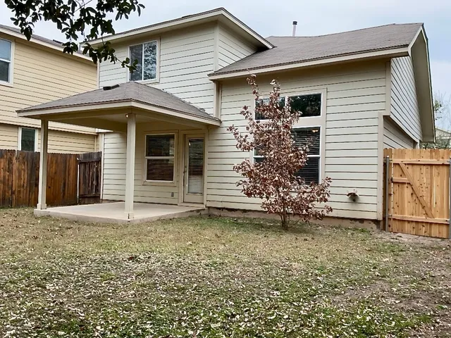 a front view of a house with a garage