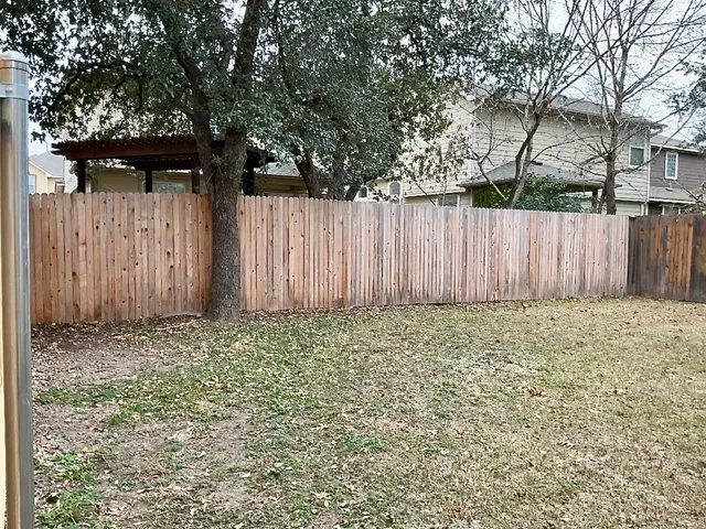 a view of wooden fence