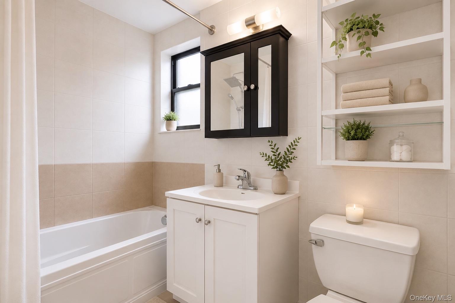 167 Sands Street, Unit 406 Brooklyn, NY 11201 - Photo 9 of 14 White ceramic tile surround, white vanity with integrated sink, black framed medicine cabinet with mirrored doors, built-in shelving, and a single window.