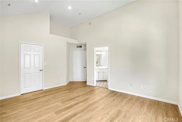 a bathroom with a sink a vanity and mirror