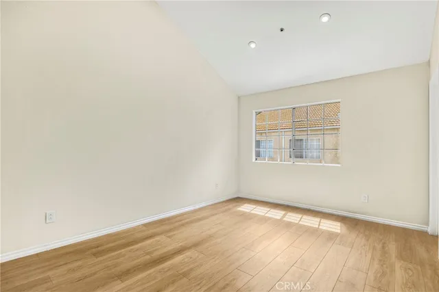 a bathroom with a sink vanity mirror and toilet