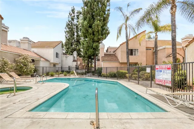 a view of a big yard with big house
