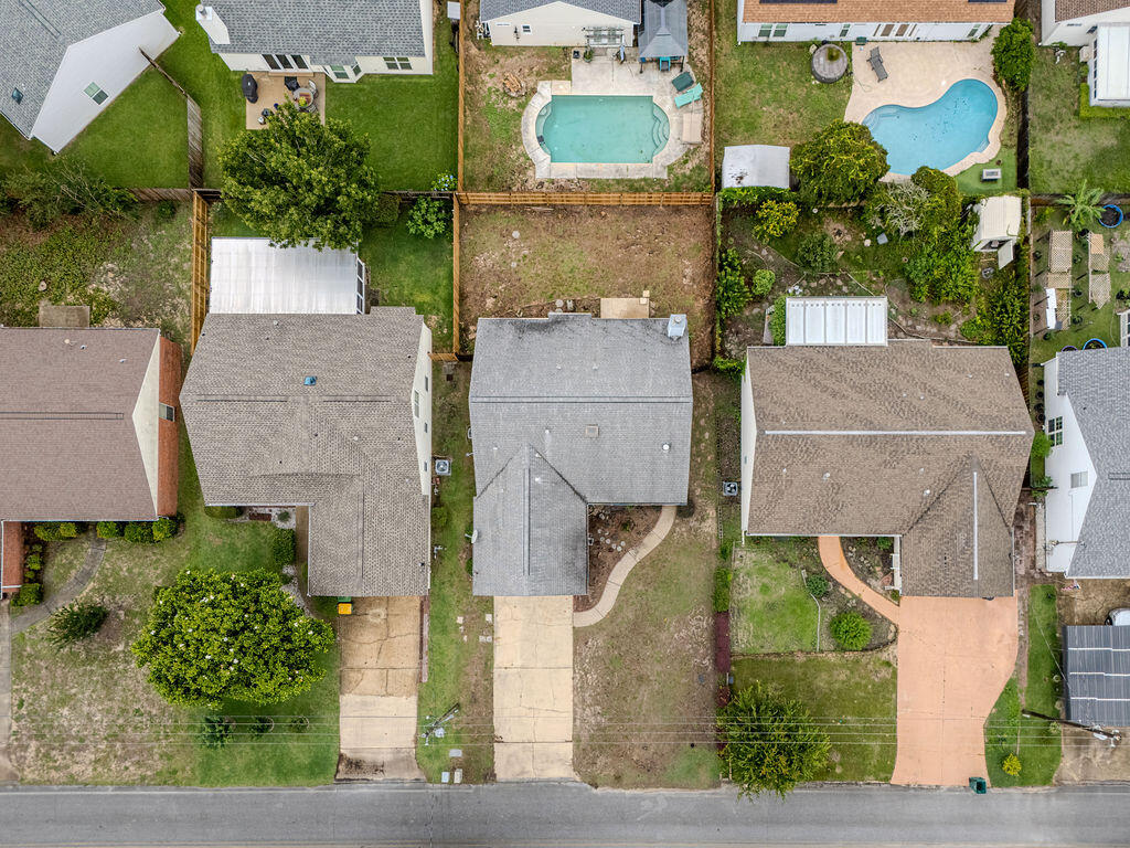 53 4th Street Shalimar, FL 32579 - Photo 39 of 47 an aerial view of a house with a yard and lake view