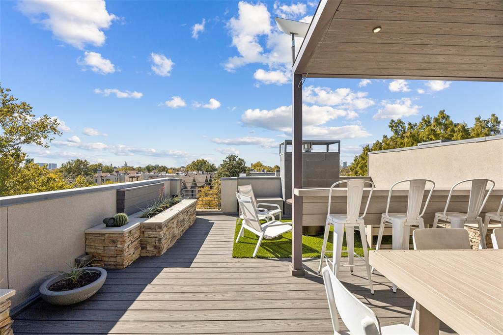 a view of a balcony with chairs