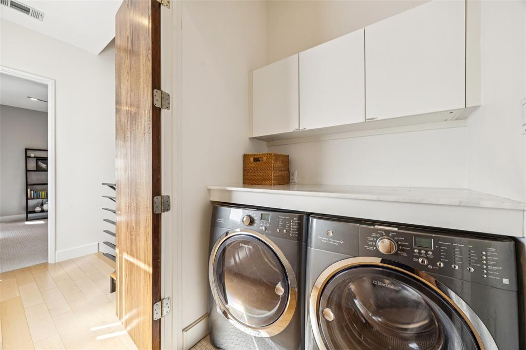 4420 Holland Avenue, Unit A Dallas, TX 75219 - Photo 20 of 32 a utility room with dryer and washer