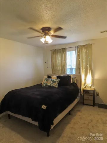 a room with furniture and window