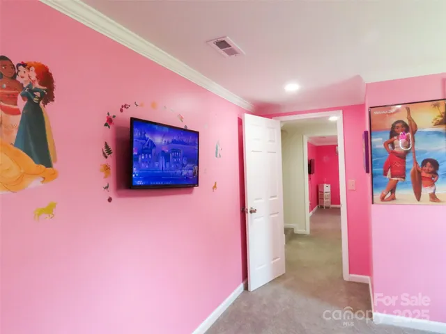 a room with toys and dresser