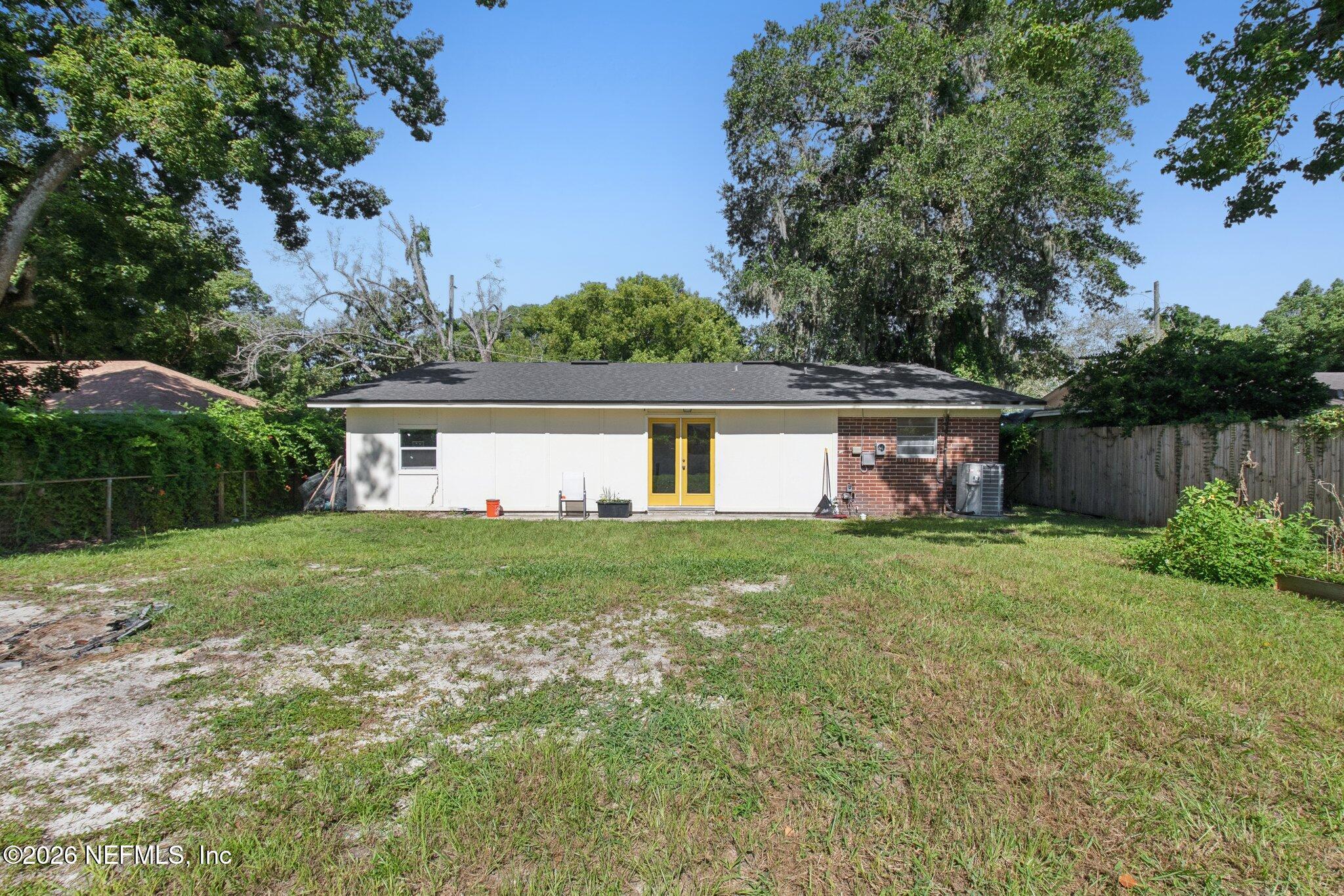 1417 Clock Street Jacksonville, FL 32211 - Photo 37 of 39 a view of a house with backyard and garden