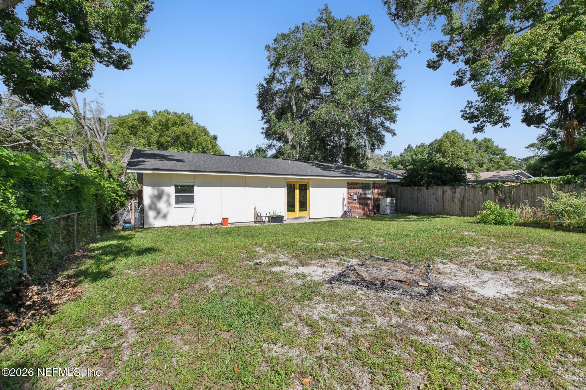 1417 Clock Street Jacksonville, FL 32211 - Photo 38 of 39 front view of a house with yard and a garden