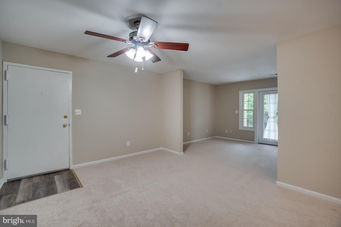 5811 Cambridge Drive, Unit 674 Springfield, VA 22152 - Photo 11 of 37 a view of an empty room with a window