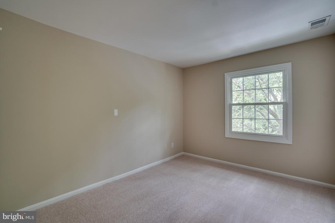 5811 Cambridge Drive, Unit 674 Springfield, VA 22152 - Photo 17 of 37 an empty room with a window