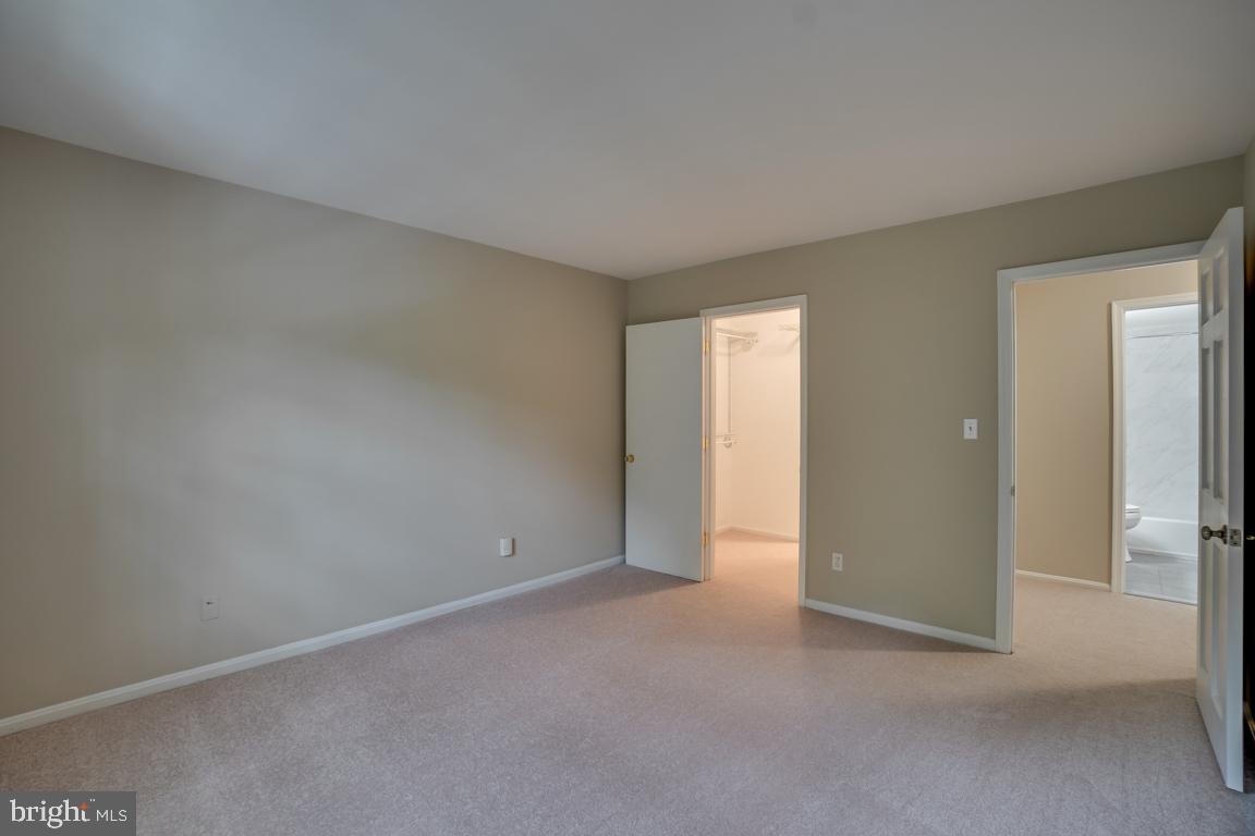 5811 Cambridge Drive, Unit 674 Springfield, VA 22152 - Photo 27 of 37 a view of an empty room and closet area