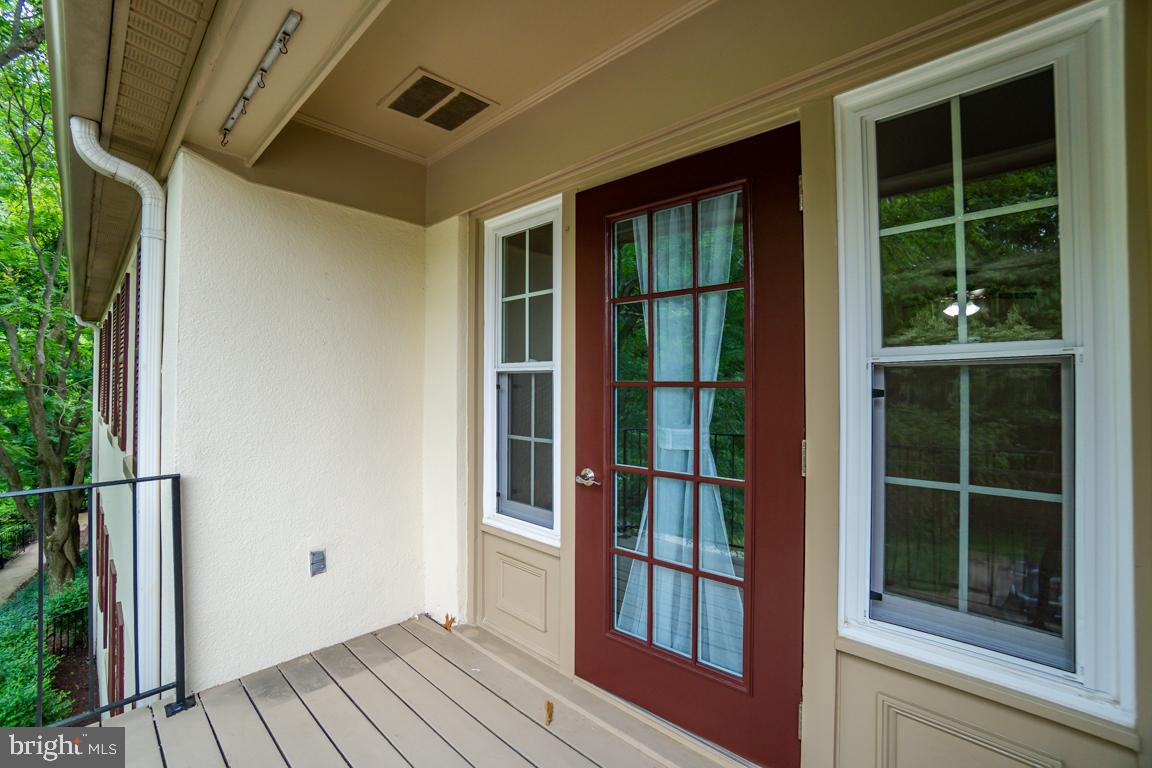 5811 Cambridge Drive, Unit 674 Springfield, VA 22152 - Photo 4 of 37 a view of front door deck