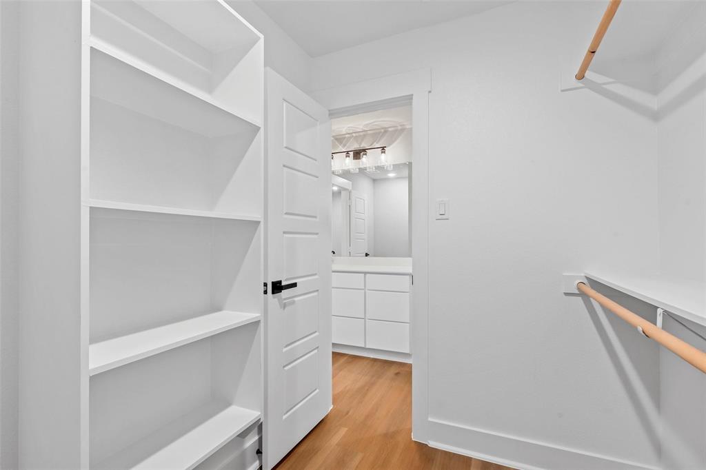 468 Peace Lily Way Tolar, TX 76476 - Photo 28 of 36 a view of walk in closet with empty racks