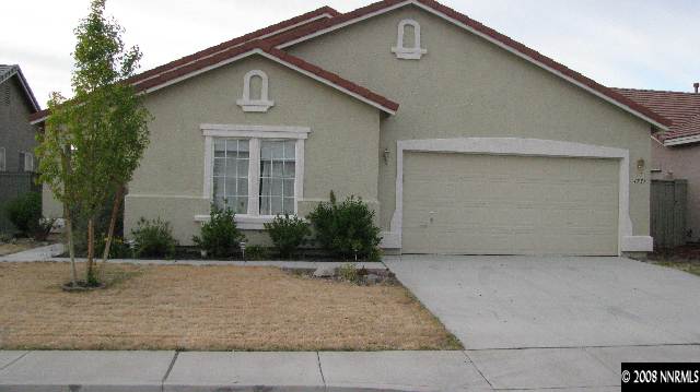 1751 Trek Trail Reno, NV 89521 - Photo 1 of 7 a front view of a house with garden