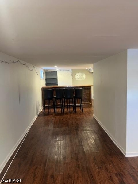 533 Edgeworth Street Middlesex, NJ 08846 - Photo 9 of 11 a view of livingroom with furniture and wooden floor