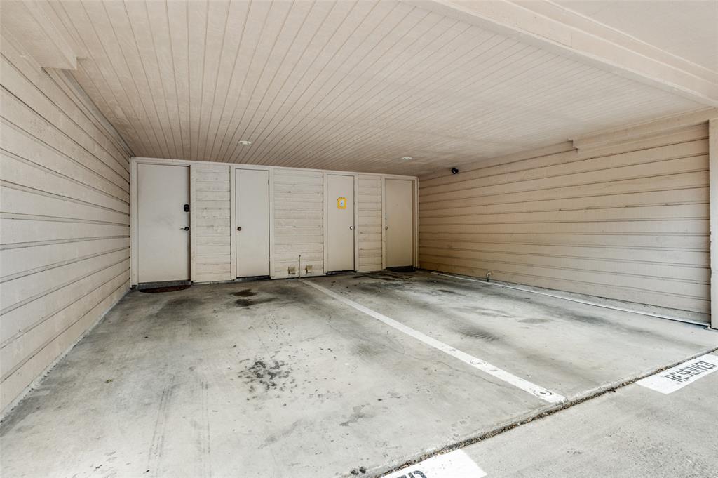 5626 Preston Oaks Road, Unit 31B Dallas, TX 75254 - Photo 12 of 17 a view of a garage