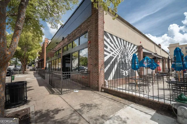 a group of cars parked in front of building