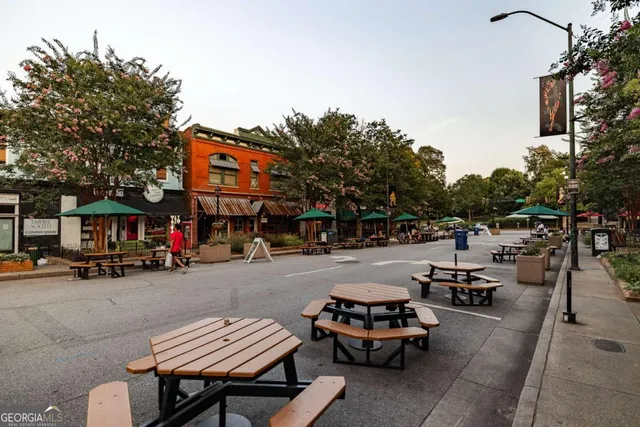 a view of a street with cars