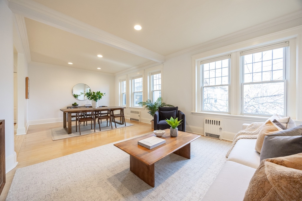 58 Dwight Street, Unit 6 Brookline, MA 02446 - Photo 7 of 21 a living room with furniture and next to a window