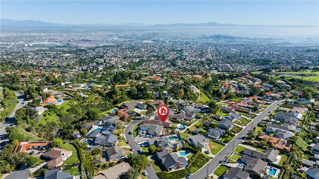 an aerial view of a house with a garden