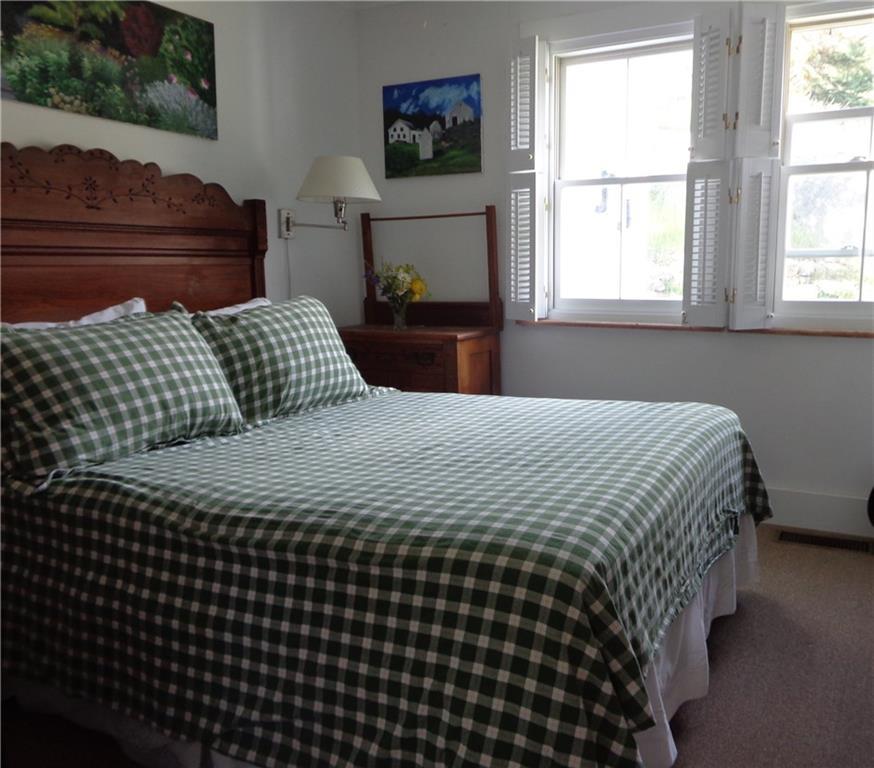 127 Ames Cv Road Vinalhaven, ME 04863 - Photo 11 of 24 One of three downstairs bedrooms.