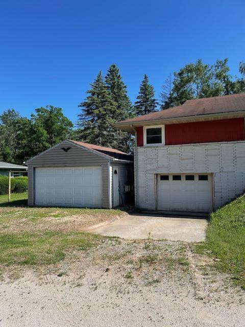 8037 Highway 147 Two Rivers, WI 54241 - Photo 1 of 1 2 garages