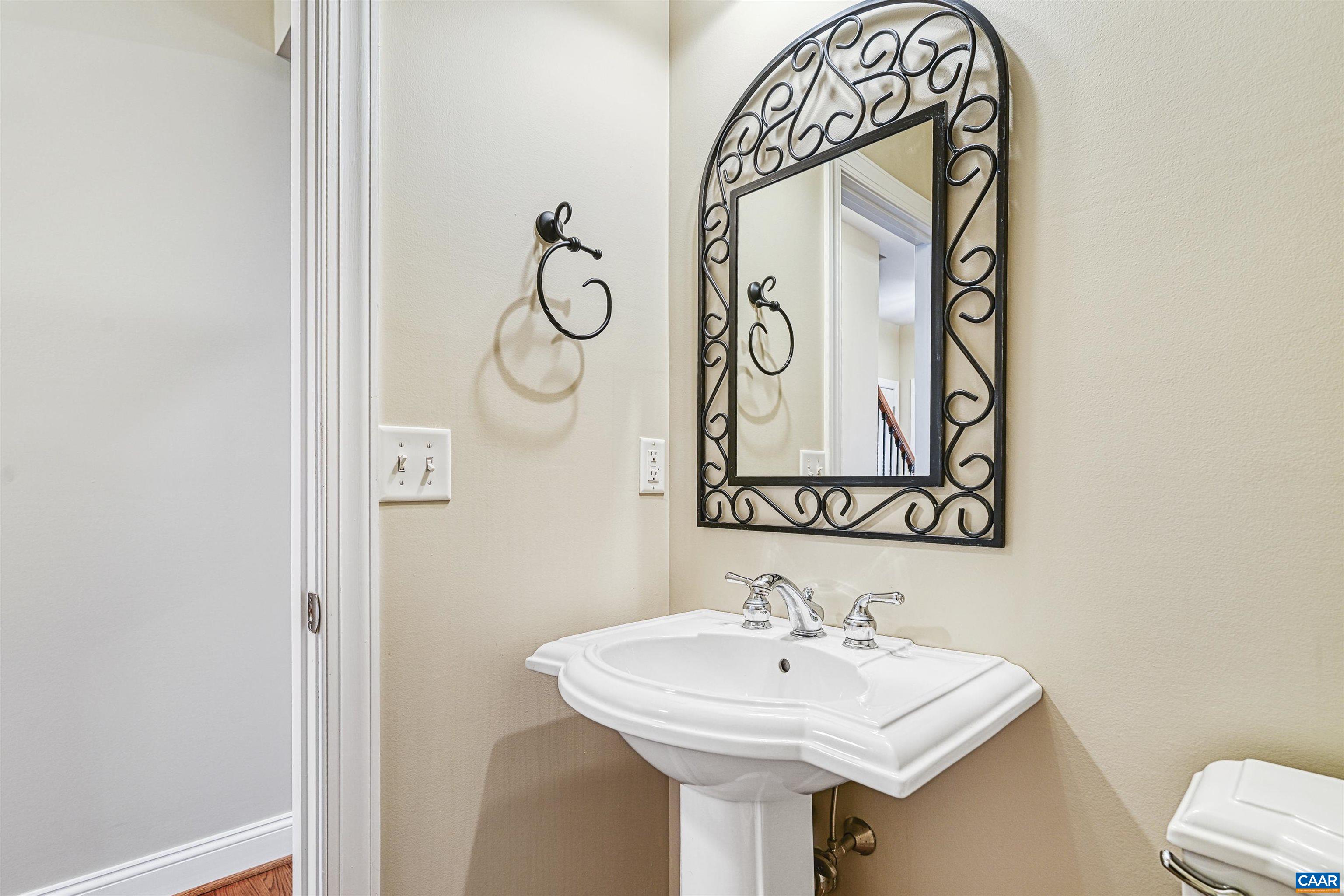 4885 Mechums River Road Charlottesville, VA 22901 - Photo 19 of 72 a bathroom with a sink and mirror