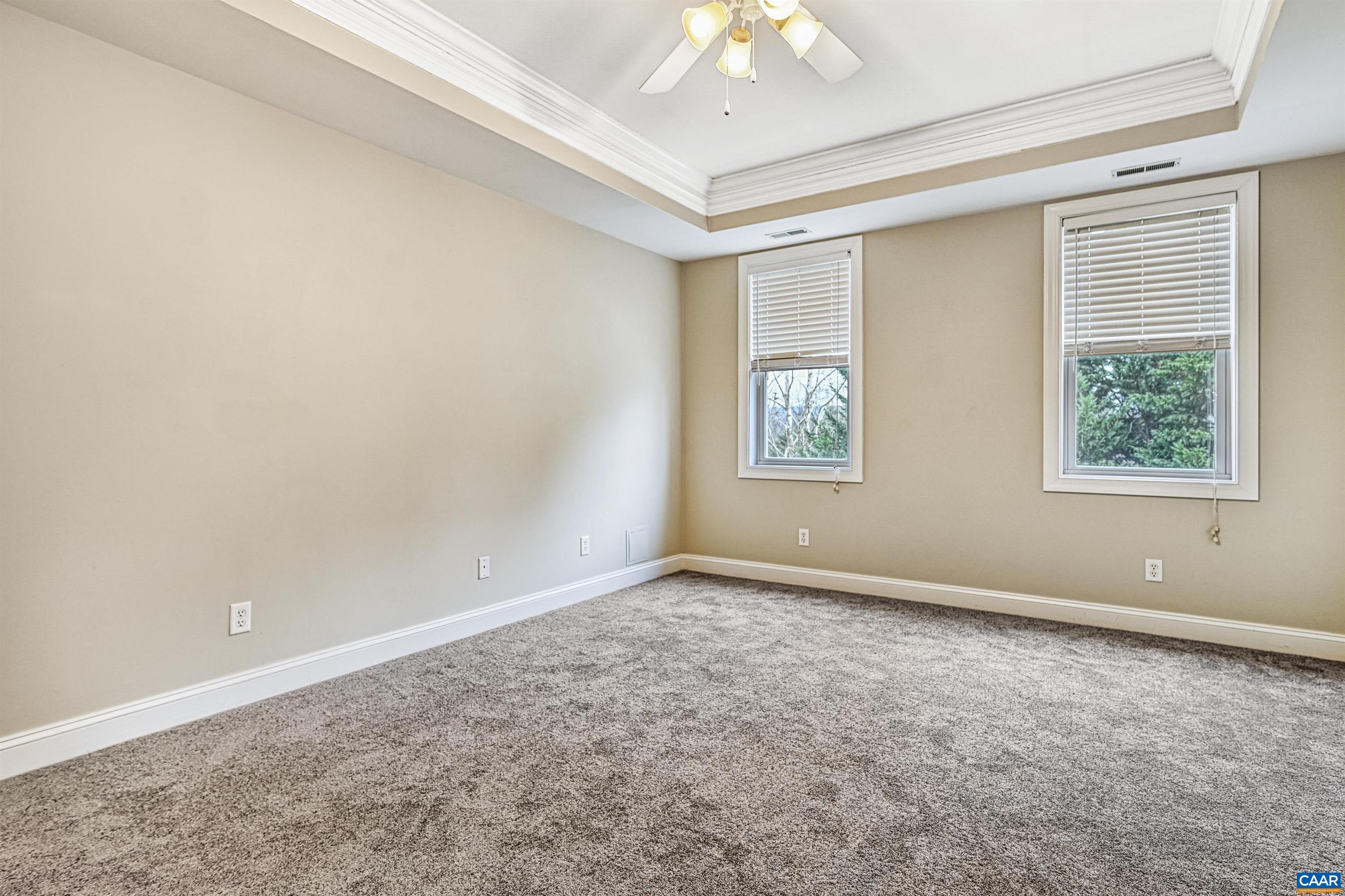 4885 Mechums River Road Charlottesville, VA 22901 - Photo 23 of 72 an empty room with windows