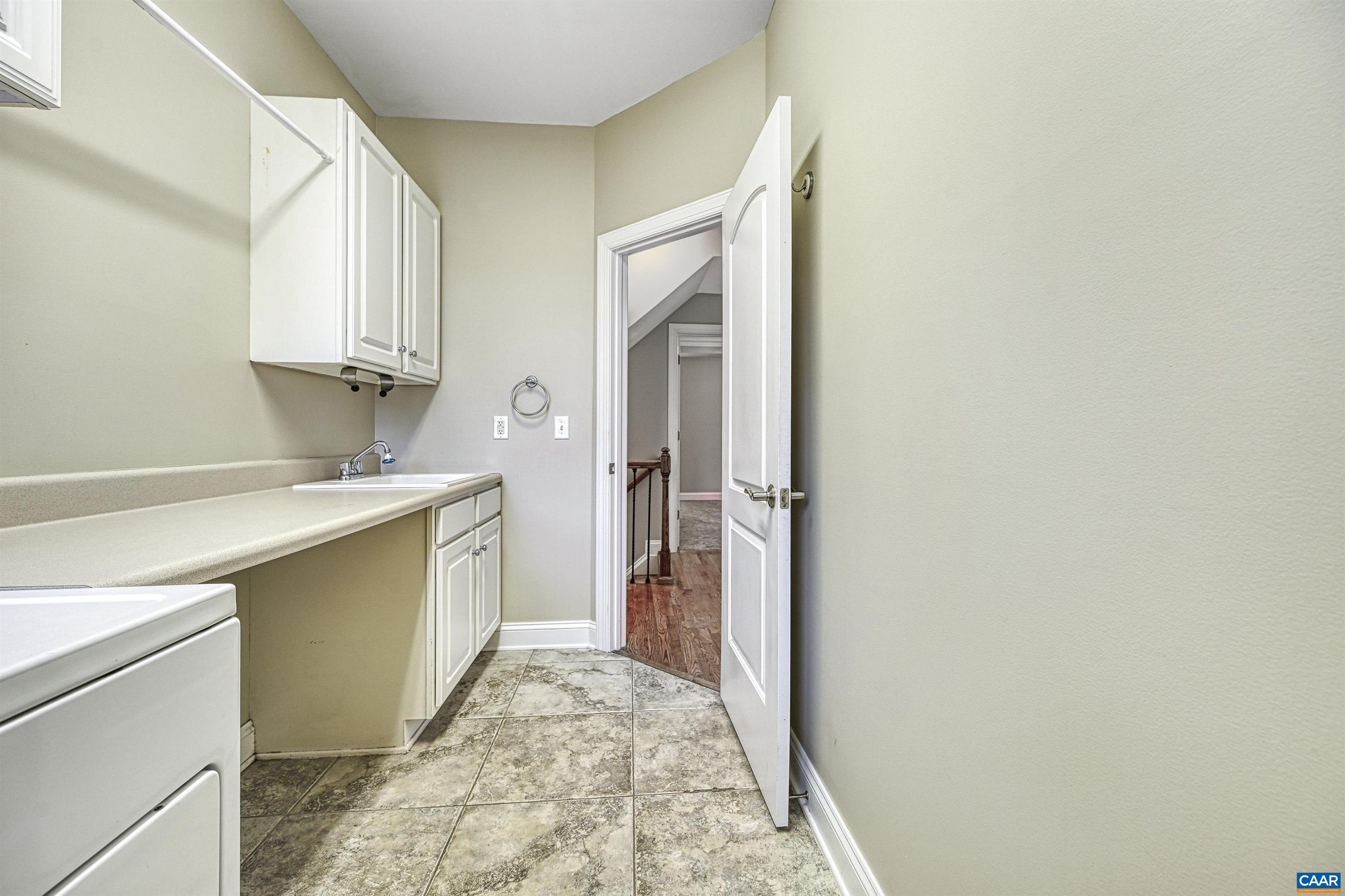4885 Mechums River Road Charlottesville, VA 22901 - Photo 34 of 72 a bathroom with a sink and a mirror