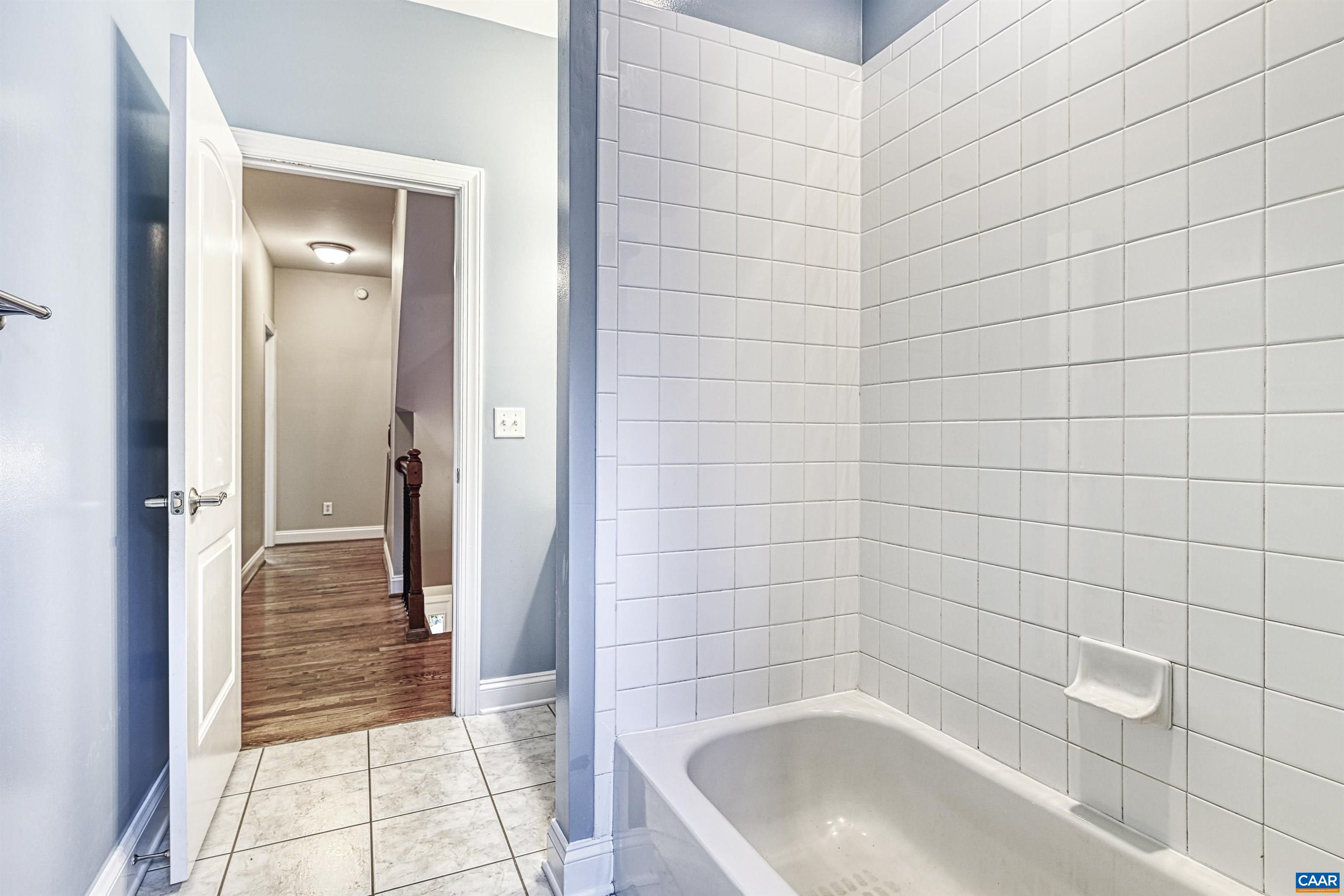 4885 Mechums River Road Charlottesville, VA 22901 - Photo 39 of 72 a bathroom with a bathtub