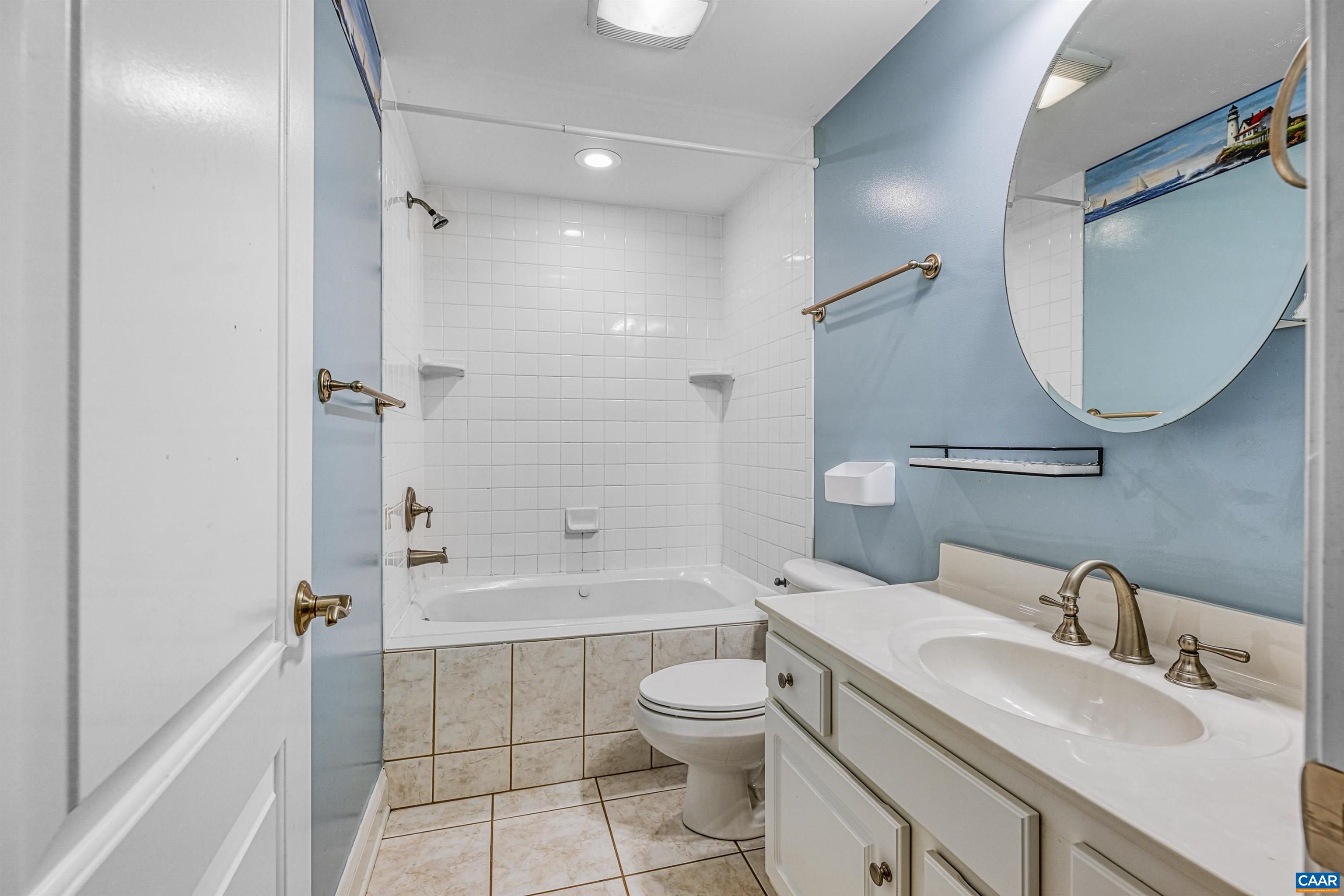 4885 Mechums River Road Charlottesville, VA 22901 - Photo 54 of 72 a bathroom with a sink a toilet and shower