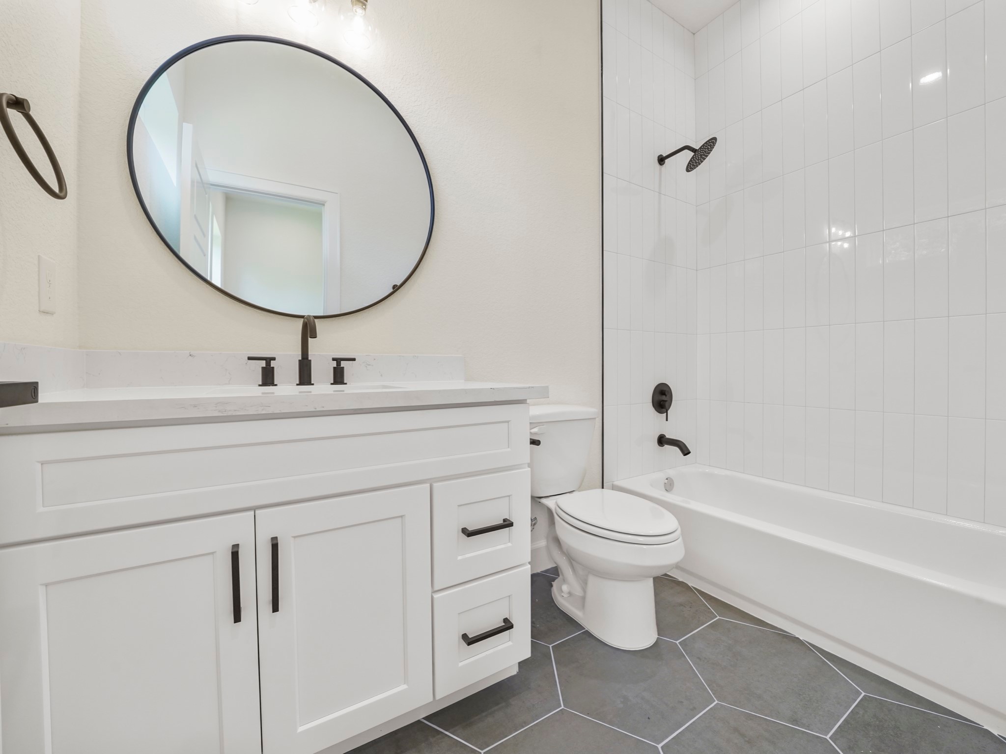 3548 Seabrook Street Houston, TX 77021 - Photo 17 of 19 a bathroom with a sink a toilet and a mirror