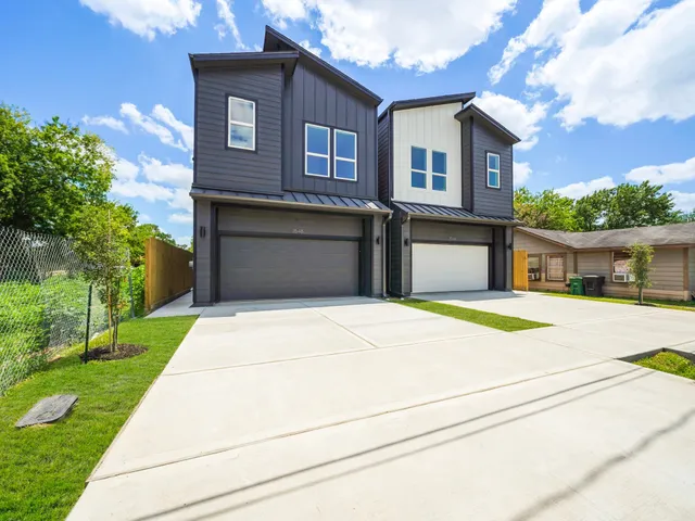 a house with yard in front of it