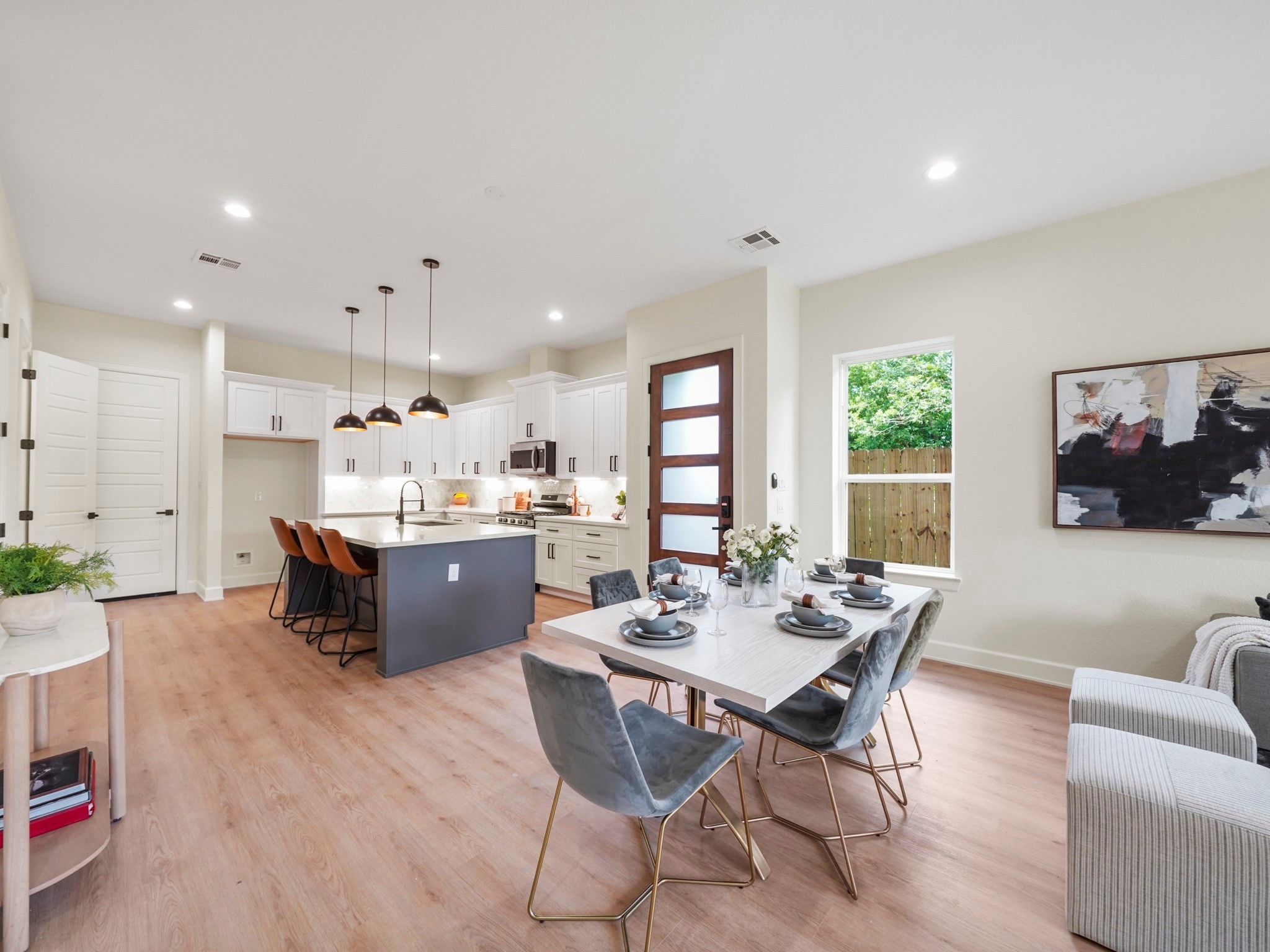 3548 Seabrook Street Houston, TX 77021 - Photo 6 of 19 a living room with stainless steel appliances kitchen island granite countertop furniture and a kitchen view