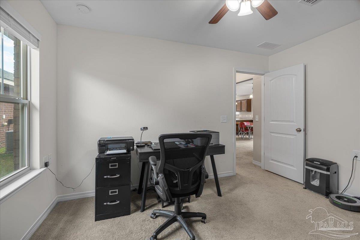 5797 Corkscrew Court Pace, FL 32571 - Photo 33 of 43 a view of a workspace with furniture