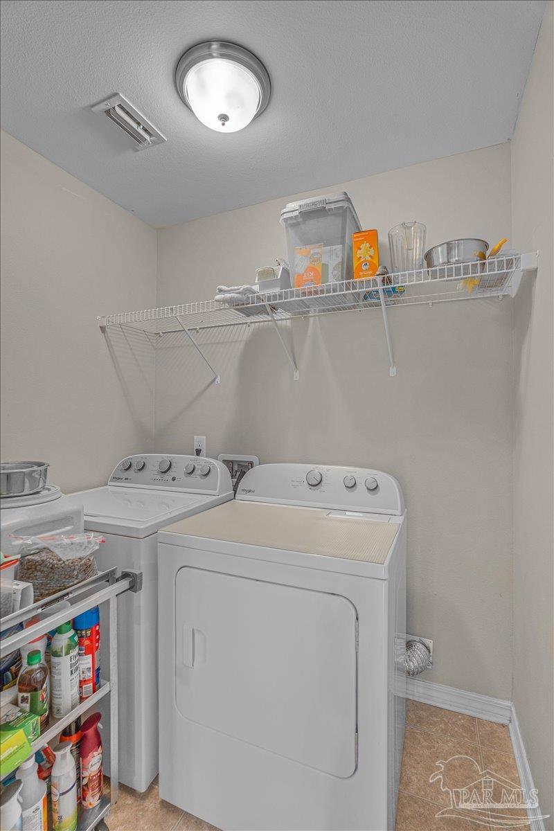 5797 Corkscrew Court Pace, FL 32571 - Photo 37 of 43 a utility room with dryer and washer