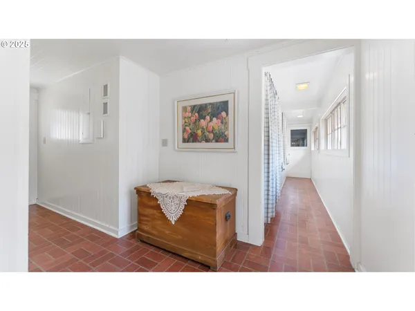 a room with furniture and wooden floor