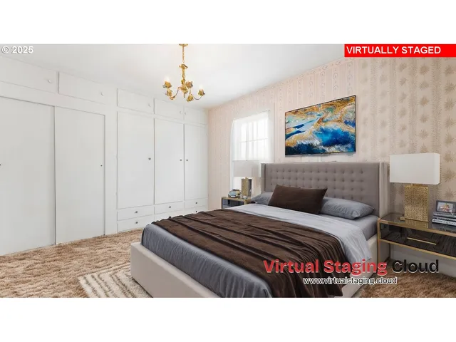 a bedroom with a bed and a painting on the wall