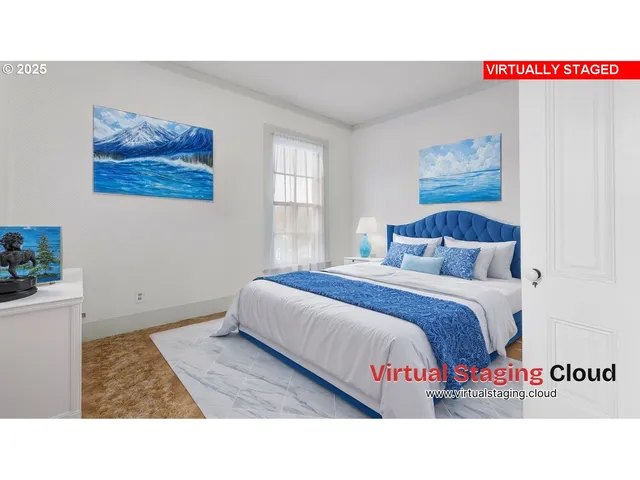 a bedroom with a bed and a painting on the wall