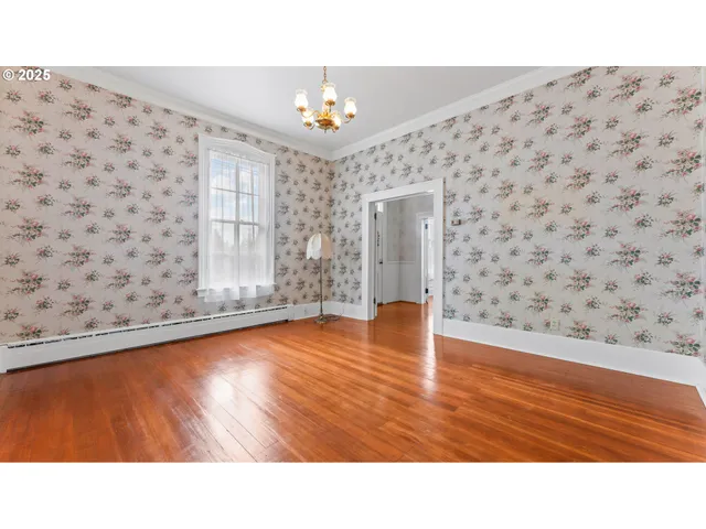 a view of an empty room and window